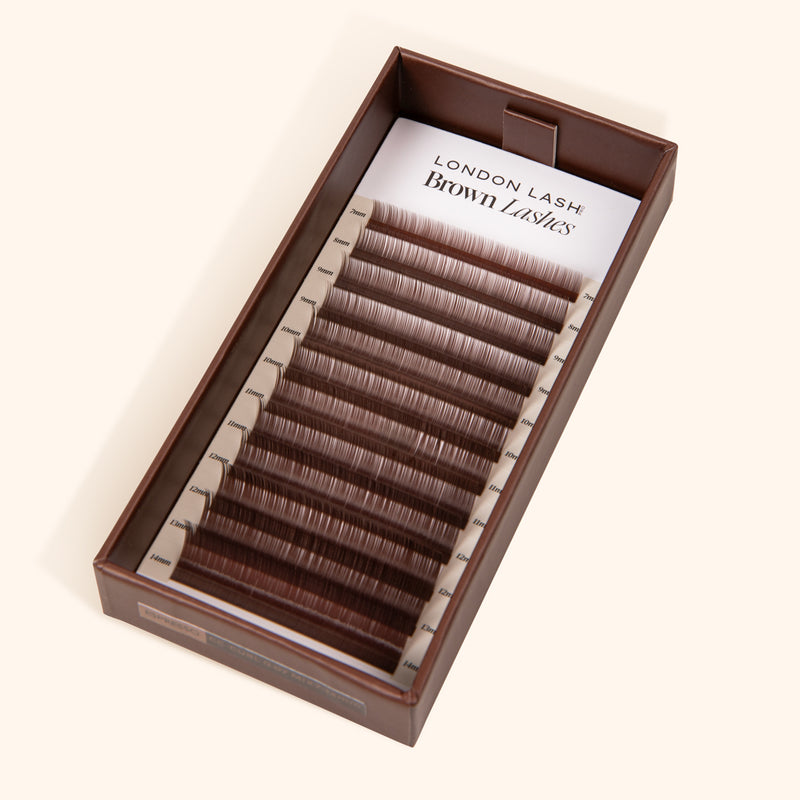 opened paper lash box with espresso brown lashes on removable lash card