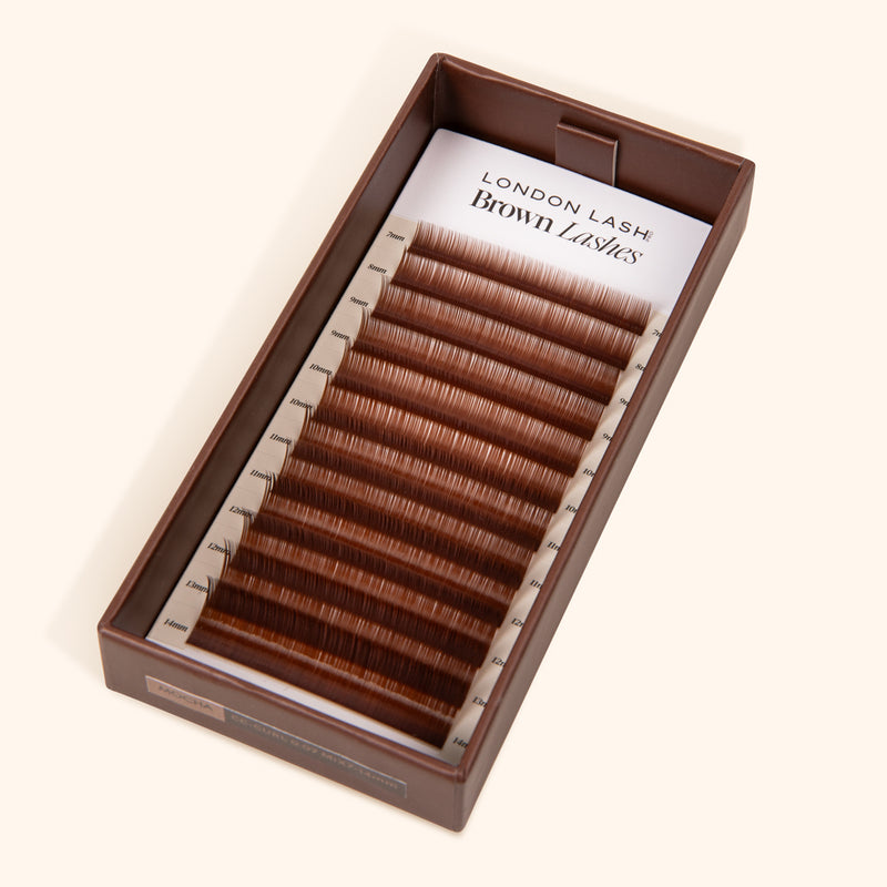 open lash tray with warm brown coffee shade eyelashes inside