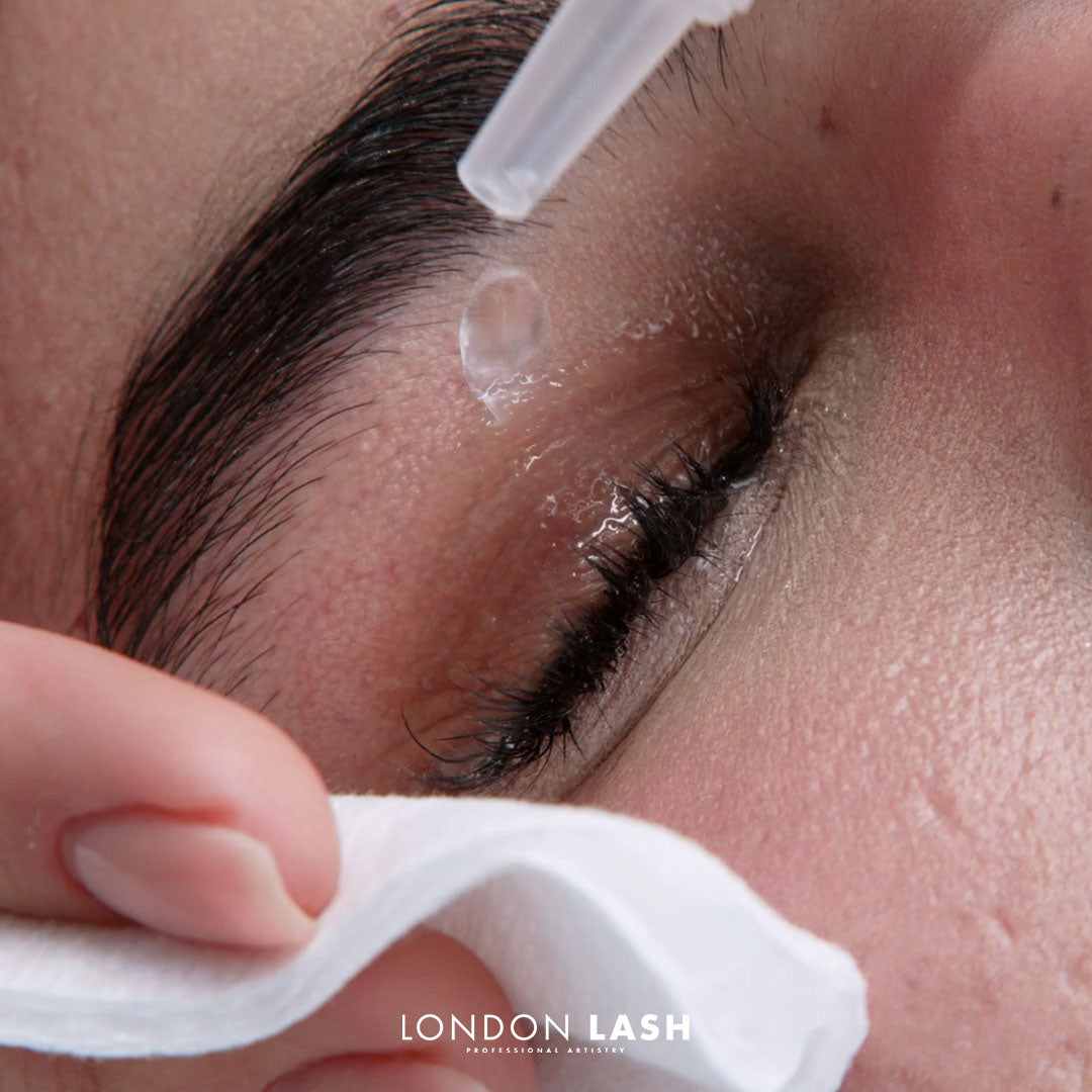 open lampot with picture of the eye close-up with beautiful eyelash extensions