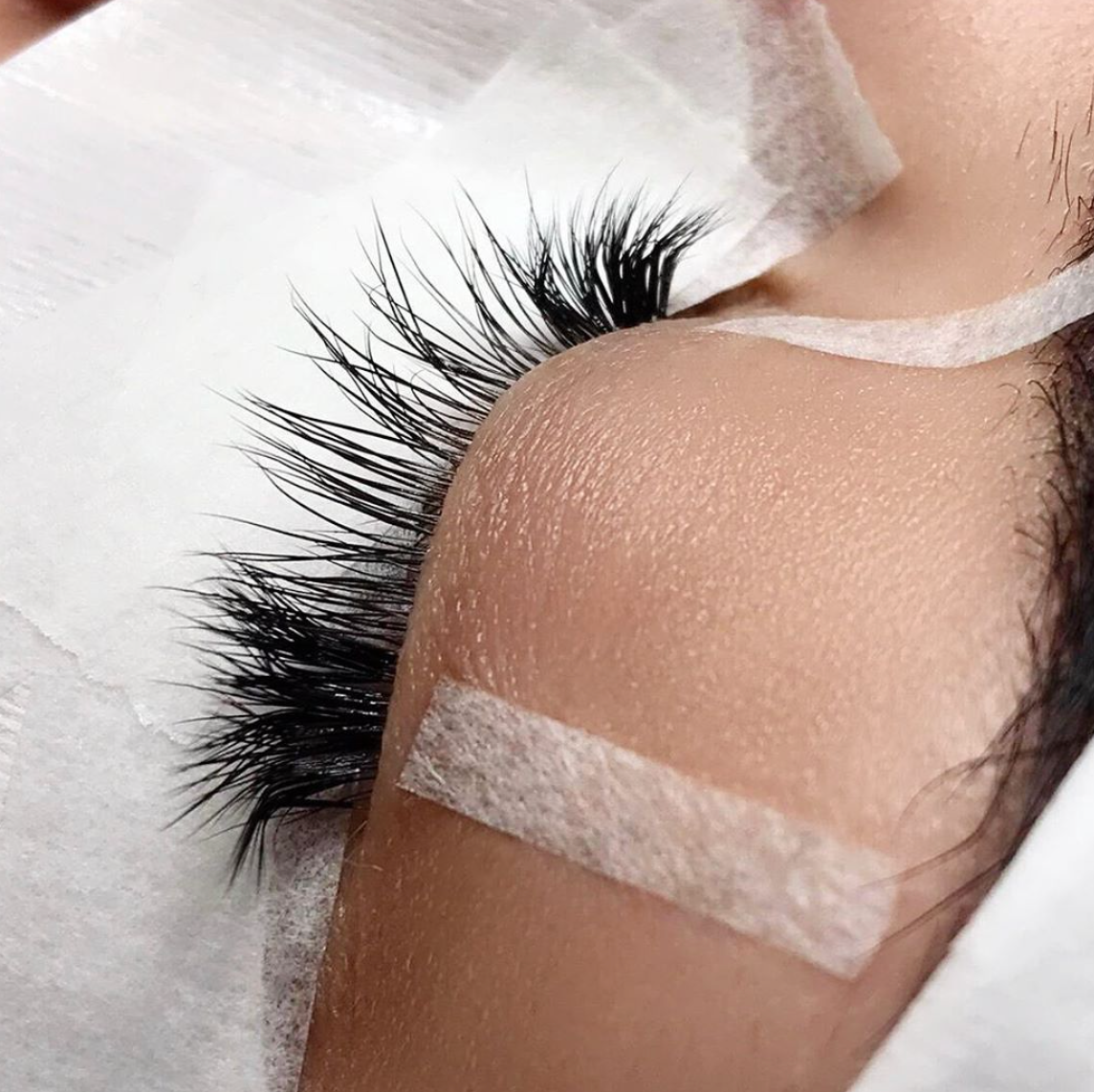 best dynarex tape being used to lift the inner and outer corners of the eyelid